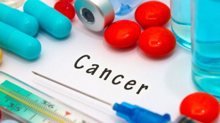 Cancer Text on Paper with Medications