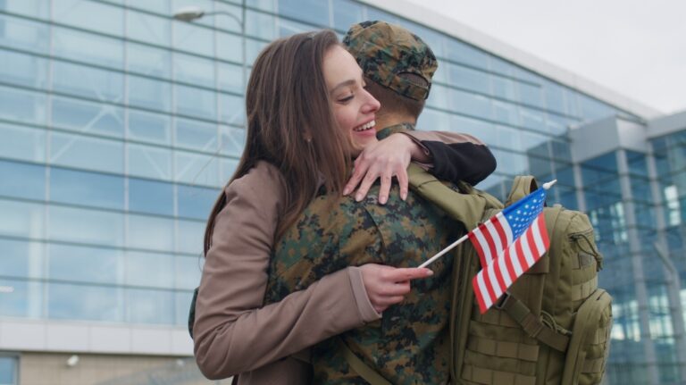 woman hugging soldier