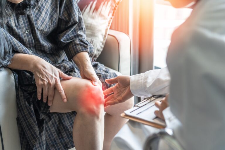 Person who has gout in their knee