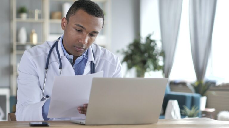 doctor reviewing papers