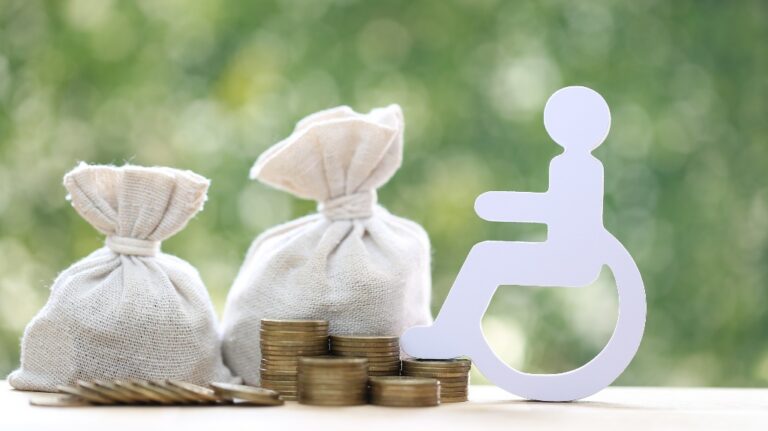 Man on wheelchair and coins