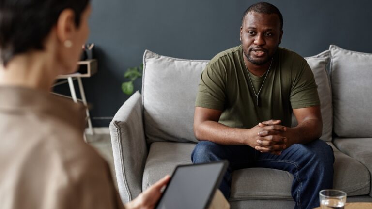 f African American adult man as army veteran sharing struggles with mental health